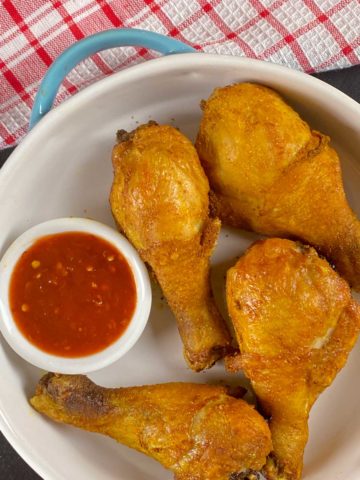 Air Fryer Chicken Drumsticks with tomato sauce - by Caramel and Spice
