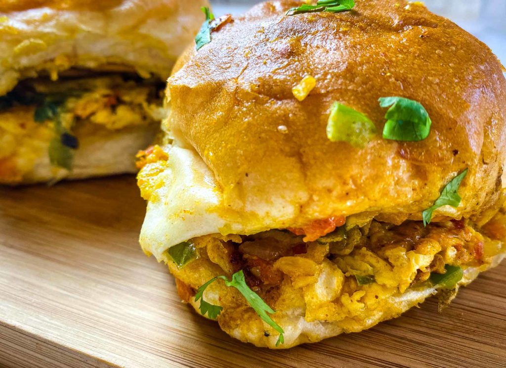 Curried scrambled eggs in white bread bun - by Caramel And Spice