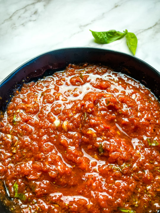 Authentic Neapolitan pizza sauce recipe in a bowl