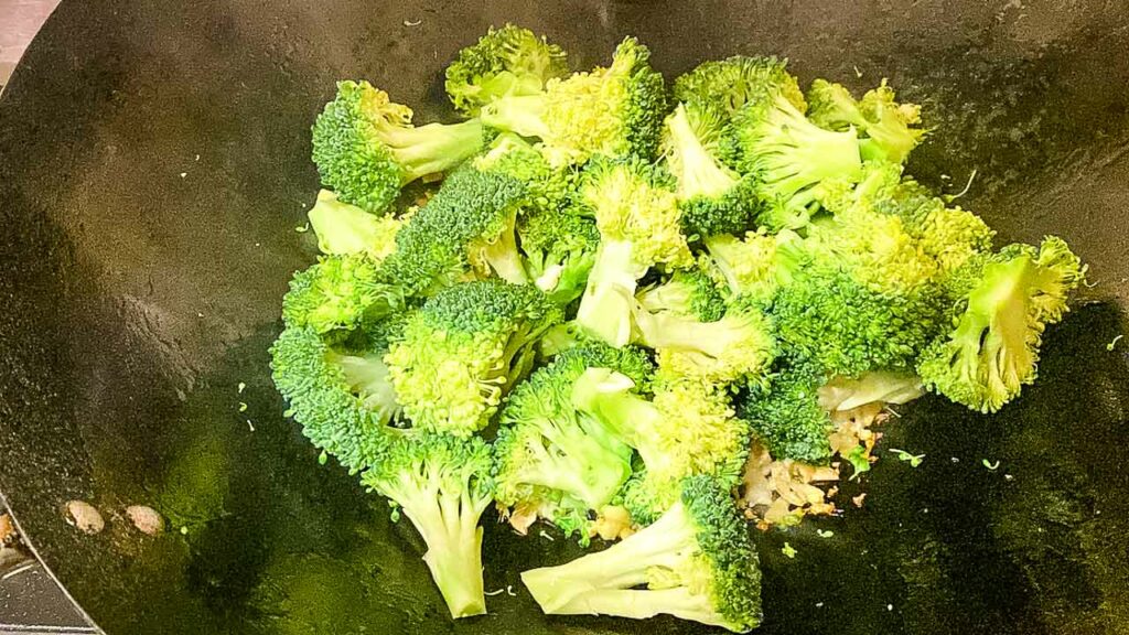 add broccoli to wok for Mongolian Crispy Tofu And Broccoli Stir Fry