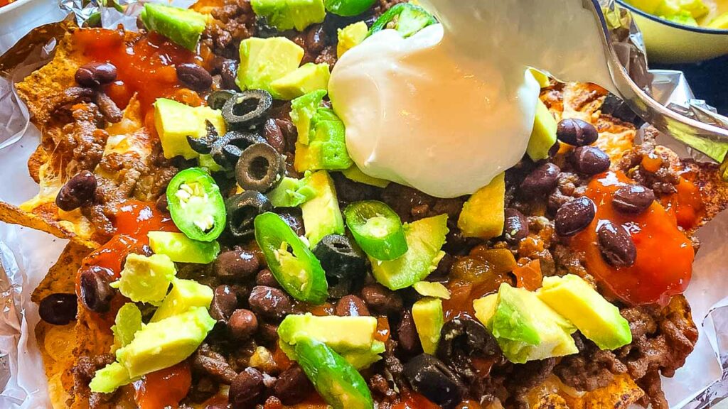 recipe for nachos with ground beef with avocado, and sour cream