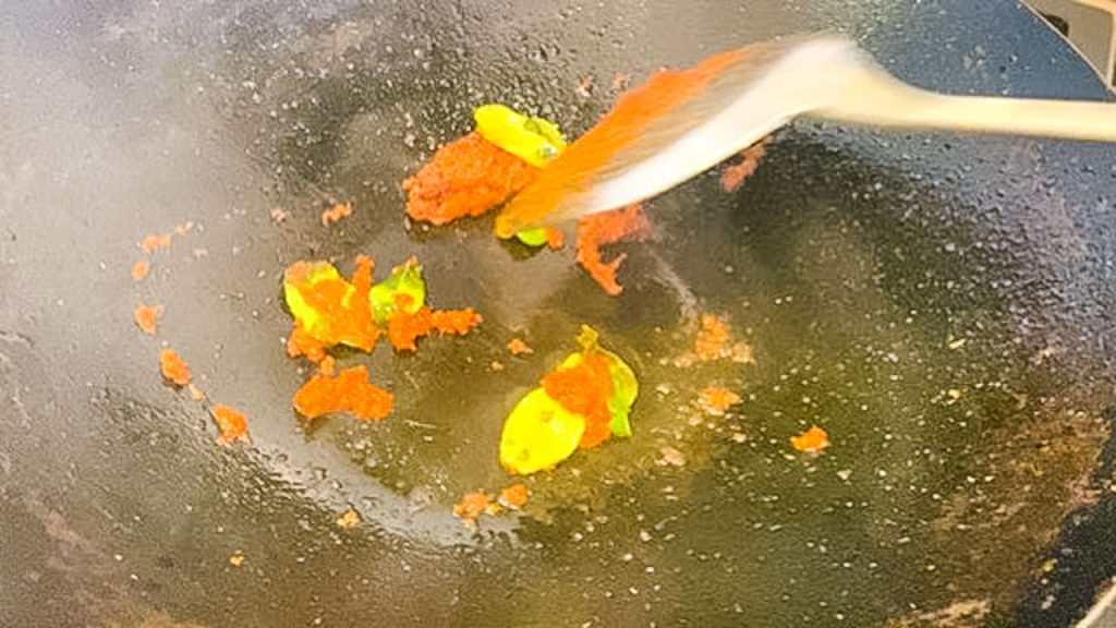 Fry Thai red curry paste.