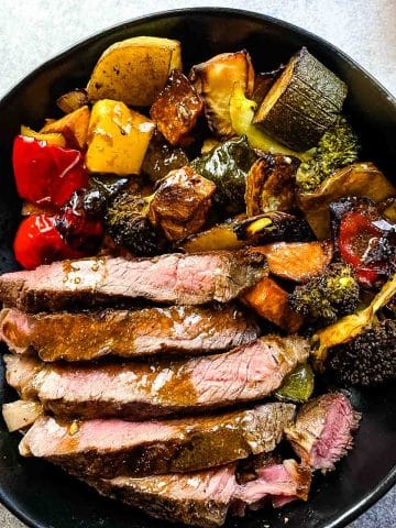 Steak with roasted vegetables.