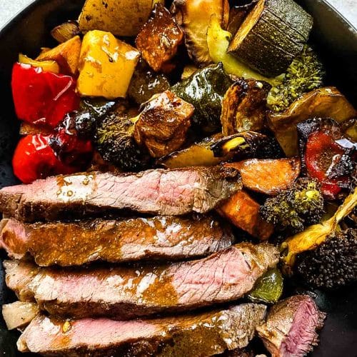 Steak with roasted vegetables.