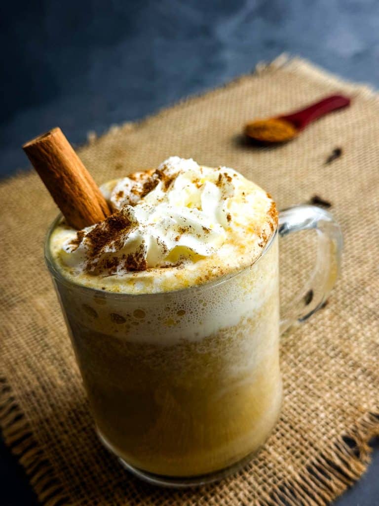 Pumpkin Spice Latte keto and regular versions in cozy fall setting)