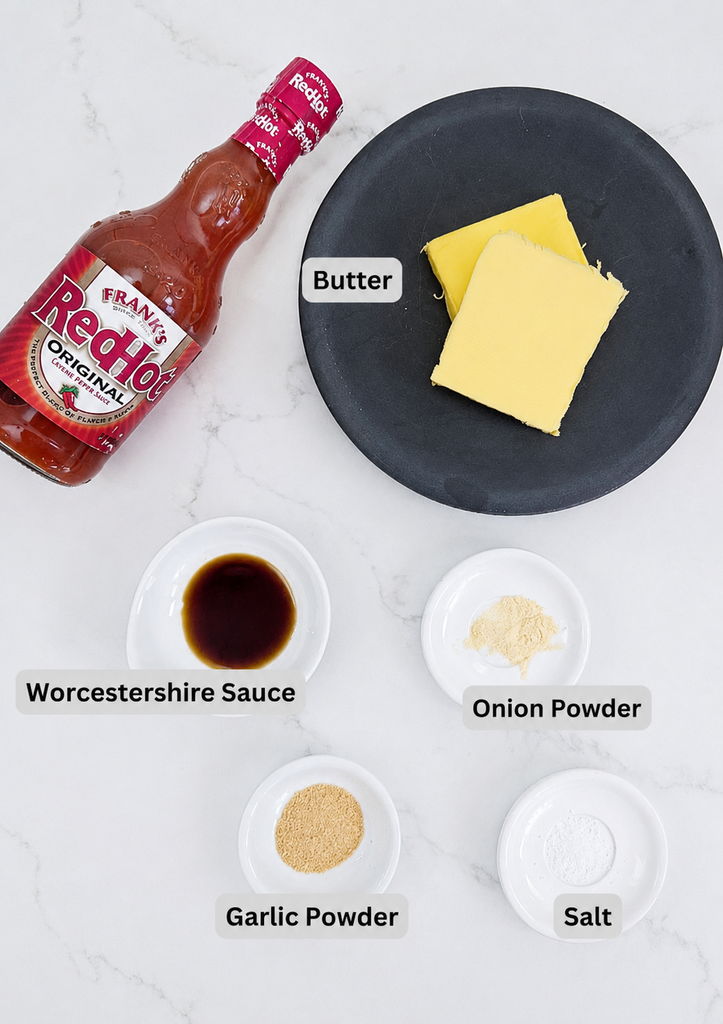 Ingredients for homemade buffalo sauce including hot sauce, butter and seasonings
